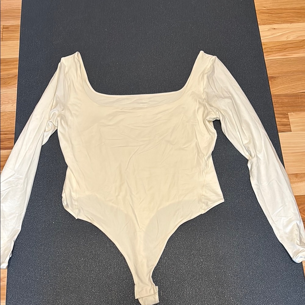 Halara Cream Long Sleeve Bodysuit
